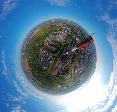 High Brick Chimney In City With Green Area, Aerial Little Planet View