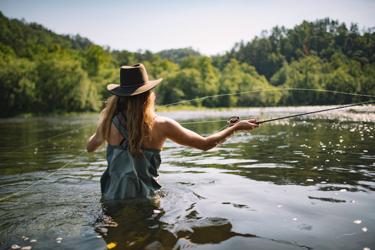 Allie Vannoy fly fishing in the Hiwassee River, TN