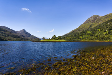 Scenic scottish landscape near Fort Williams with idyllic lake surrounded by little mountains, Scotland