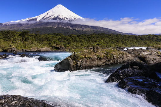 Petrohue rapids, snow-capped, conical Osorno volcano, Vicente Perez Rosales National Park, Spring, Lakes District, Chile