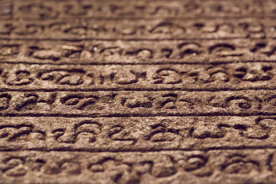 Sinhalese language stone book on wall of 12th century stone Hindu structure. Polonnaruwa, Sri Lanka. UNESCO World heritage Site - Powered by Adobe
