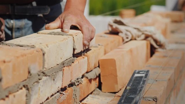 Brick masonry close-up, construction of a new house