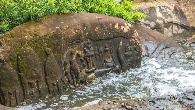 4K Time lapse of Ancient rock carvings at the waterfall call Kbal Spien in Siem Reap of Cambodia