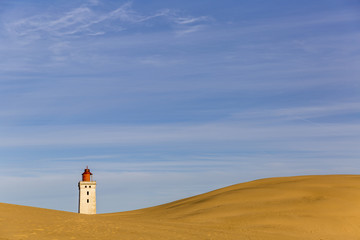 Rubjerg Knude lighthouse buried in sands on the coast of the North Sea