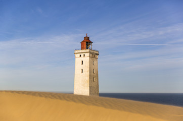 Rubjerg Knude lighthouse buried in sands on the coast of the North Sea