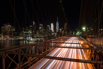 Fototapeta na wymiar The Brooklyn bridge from a nice perspective by night, New Yok, United States of America