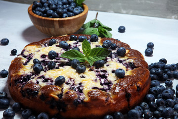 Blueberry pie or homemade lemon cupcake with blueberries. Delicous dessert blueberry tart