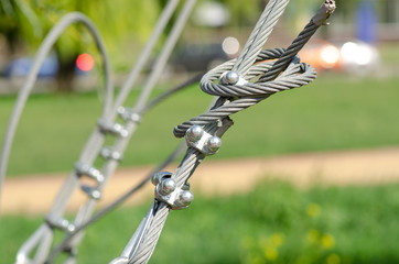 Metal rope fastening, a park of rock-climbers