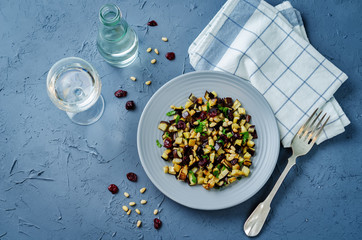 Eggplant pine nuts parsley dried cranberries salad