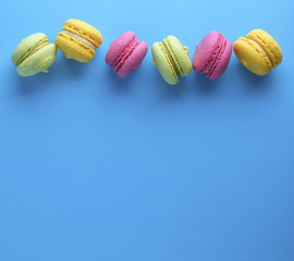 Obraz premium multicolored cakes of almond flour with cream