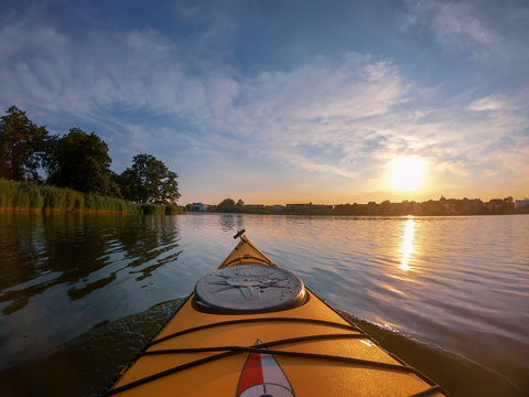 Kayaking on the lake, evening sun