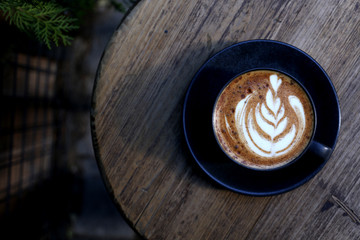 coffee latte on wooden table