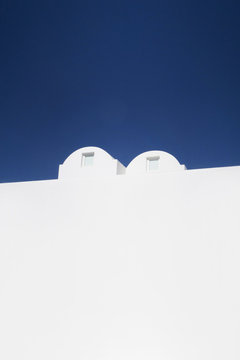 Minimalistic Greek White Architecture And Blue Sky