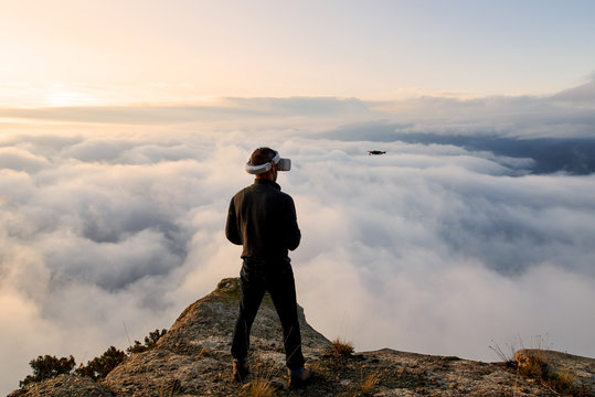 On top of the world controlling quadcopter.
