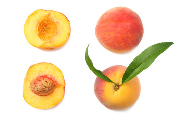 peach fruit with green leaf and slices isolated on white background. top view