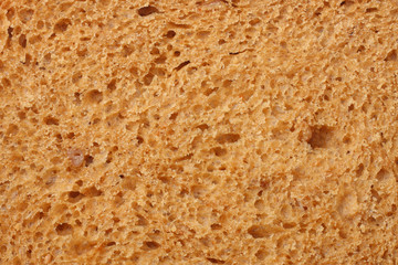 Whole grain bread texture background. macro. top view