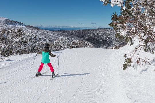 girl skiing, beginner