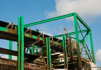 Old equipment for transportation and distribution salt. Industrial elevator.
