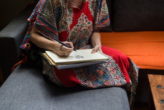 Portrait of woman  working on some artistic design