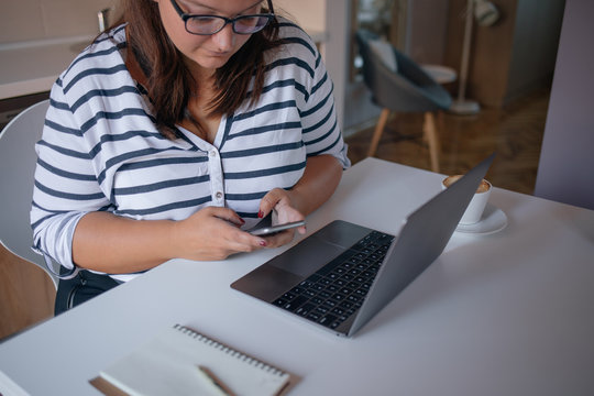 Woman Looking at her Phone