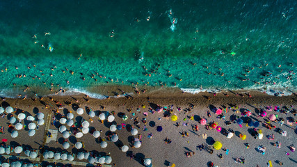 Aerial view of beautiful blue gulf and long Konyaalti beach in Antalya, Turkey. Antalya is Turkey's biggest international sea resort located on Turkish Riviera.