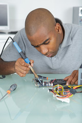 Man soldering