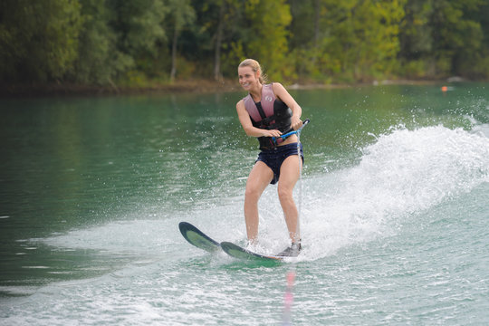 Happy Young Girl On A Water Ski