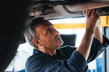 Mechanic at work in his garage