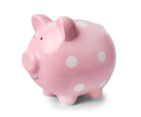 Pink piggy bank on gray background. Money saving