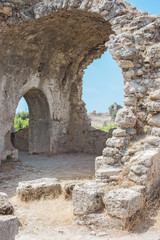 Ancient Side. Turkey. Ruins of the ancient city. Hospital. Interior. Arched doorway and window