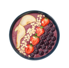 Obraz premium Bowl with tasty acai smoothie on white background, top view