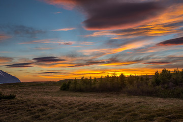 The sunset is reflected in the clouds