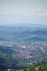 Fototapeta na wymiar Cityscape of Alba and Langhe hills