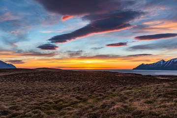 Sunset on island of Hrisey in Iceland