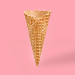 empty ice cream cone, on a pink background