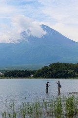 Local fishermen in front of Mt Fuji