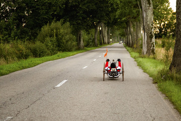 Sportive man riding handbike