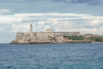 Fototapeta na wymiar beach landscape with an island castle in the background