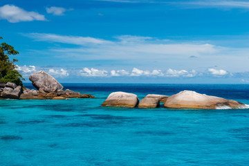 Beautiful turquoise tropical ocean and lush green islands (Similan Islands, Thailand)