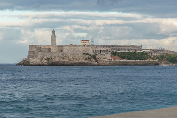Fototapeta na wymiar beach landscape with an island castle in the background