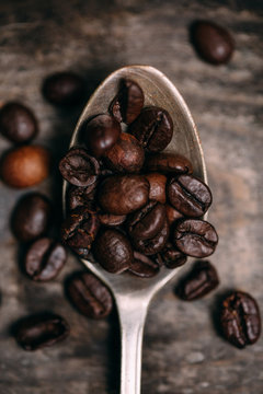 coffee beans on a teaspoon