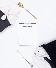 Flat lay of business or office formal suits. Male and female clothes.