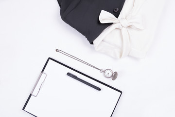 Flat lay of business or office formal suits. Male and female clothes.