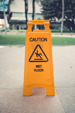 Yellow wet floor sign
