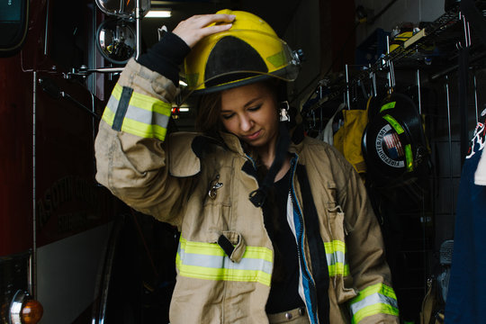 teenage firefighter volunteer wearing firefighting clothing