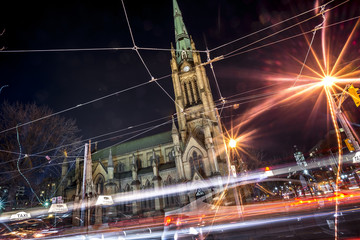 St. James Cathedral in Toronto with light trails from traffic at night