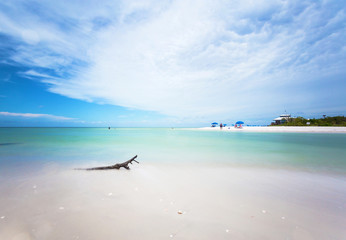 Panoramic view of a Beach in Naples at early morning with the sun coming up in a summer sunny day, Florida, USA.