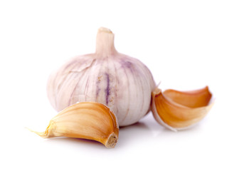 Isolated garlic. Raw garlic with segments isolated on white background, with clipping path