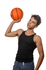 Obraz premium Teenager with sportswear playing basketball. White background.
