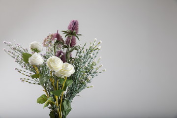 beautiful bouquet of fresh flowers on light background.